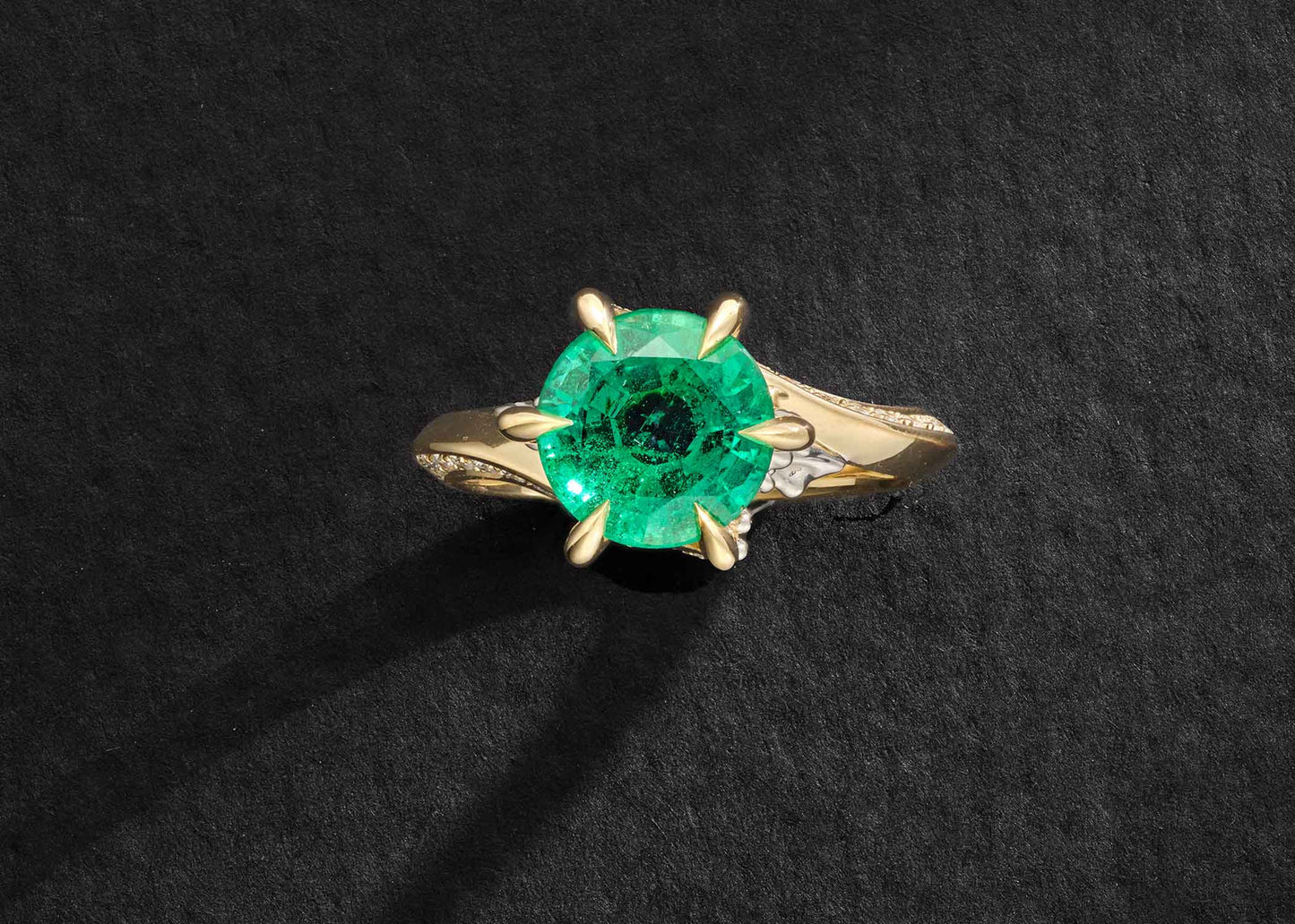 One-of-a-Kind Round Emerald ring with Waterfall Detail